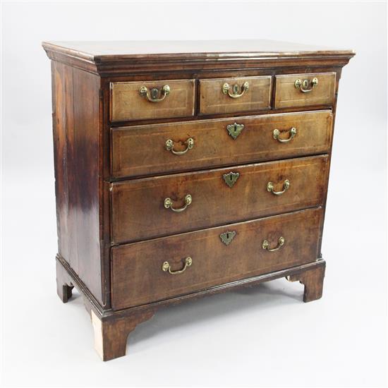 An 18th century walnut and featherbanded chest, W.3ft 4in.